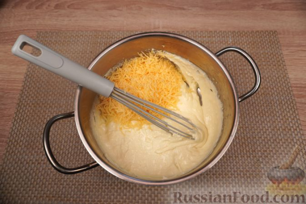Хек, запечённый с кабачками и сливочным соусом