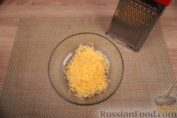Хек, запечённый с кабачками и сливочным соусом